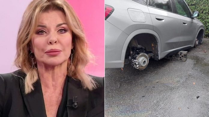 Alba Parietti e la sua auto dopo il furto di pneumatici subito a Basiglio